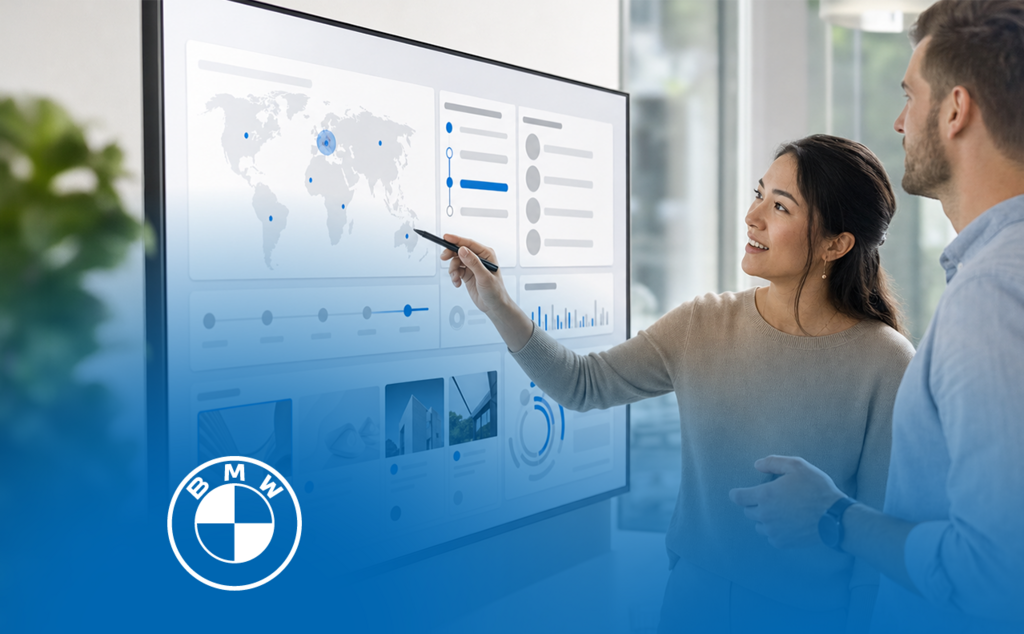 Two people analyzing a digital BMW sales and marketing dashboard. – AI-generated image
