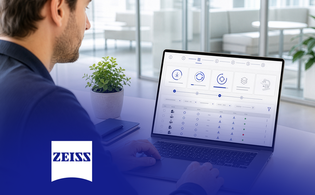 ZEISS Update-Management-Dashboard auf einem Laptop im Büro. – KI-generiertes Bild