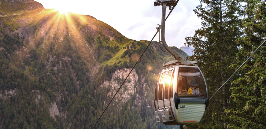 photo of cable car in nature