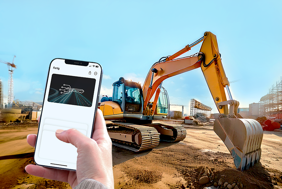 Smartphone mit digitalem Fahrzeugschlüssel, im Hintergrund ein Bagger