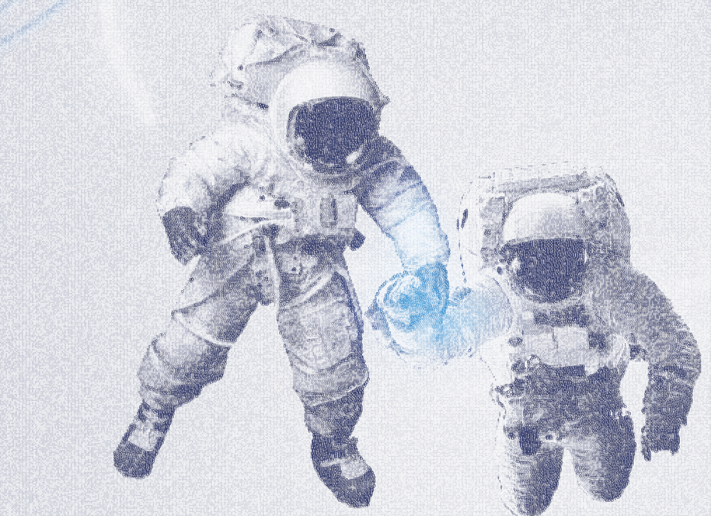 Aufnahme von zwei schwebenden Astronauten